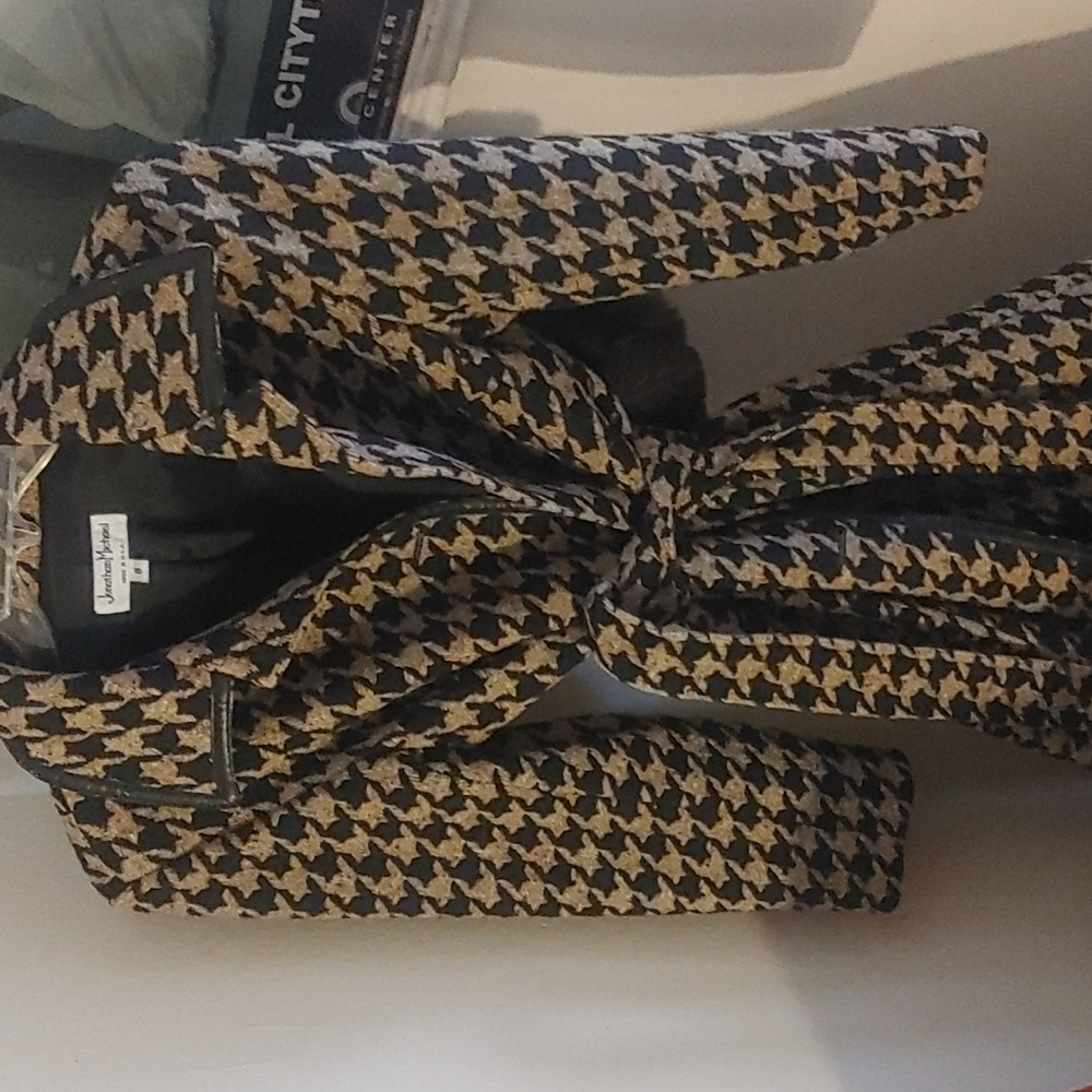 6 Items, 1 knee length coat, 3 sweaters, 1 pair of rain boots, 1 jacket